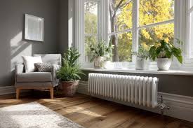 modern radiator in UK home for heat pump heating system
