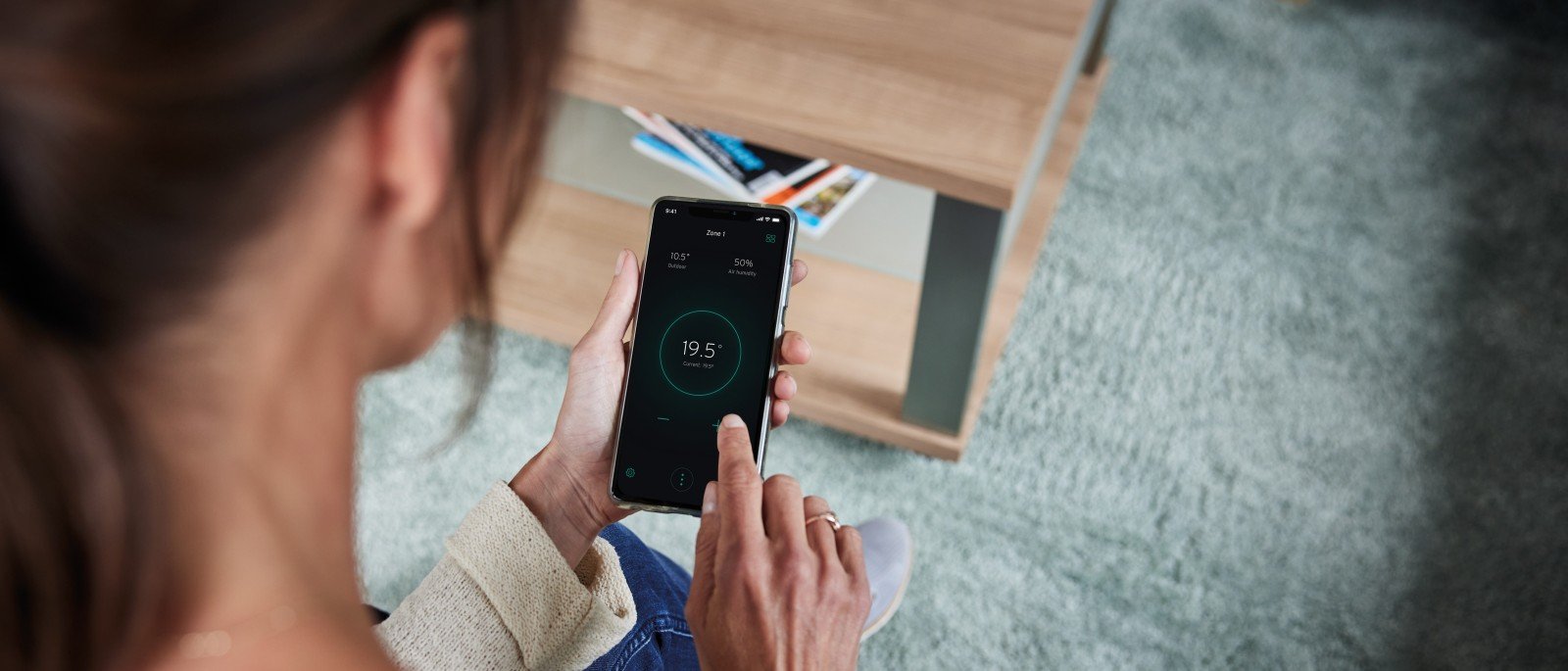 Official Vaillant image showing the myVAILLANT app in use