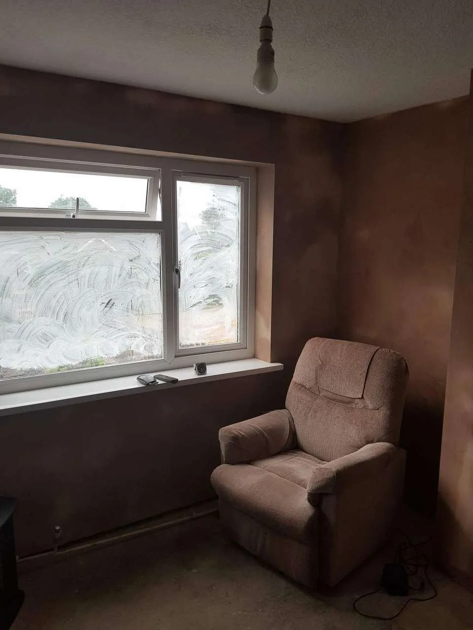 Interior wall exposed for damp and repair work during Josh's home renovation