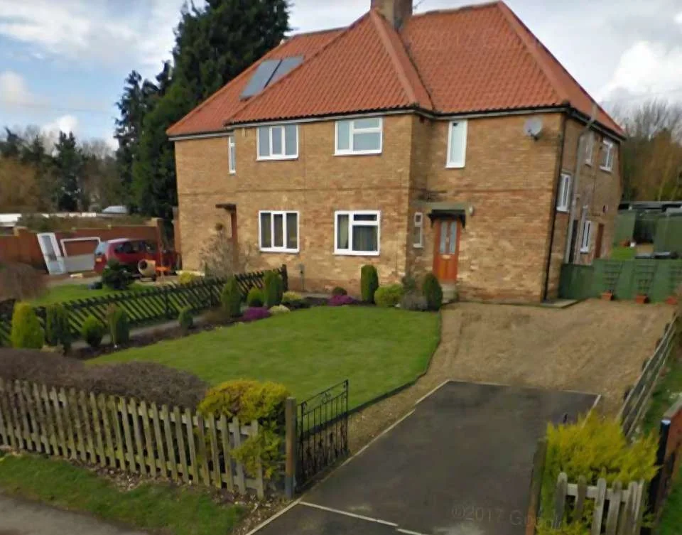 The brick house before major retrofit work